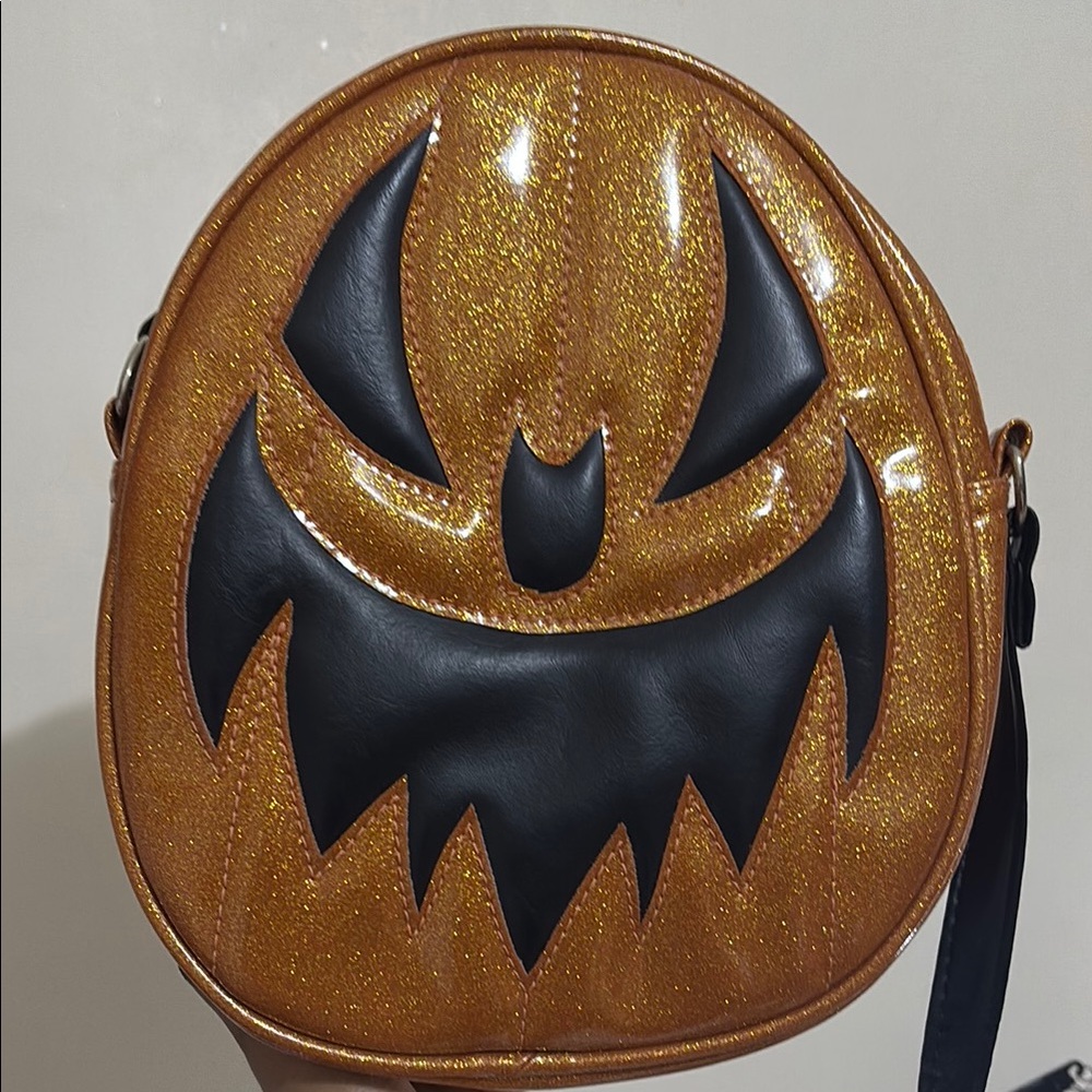 Love, Pain, and Stitches handmade oval bag